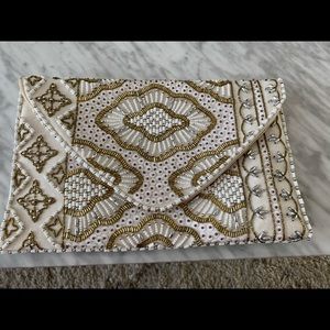 White/gold beaded clutch